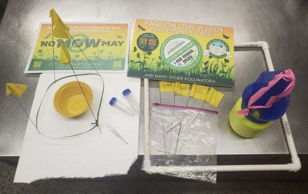 No mow may kit with various equipment
