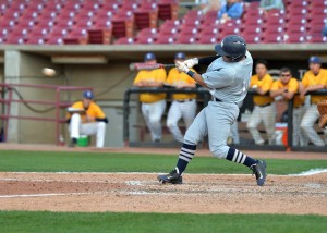 Lawrence's Jake Gordon connects on record-breaking career hit No. 155 vs. Carleton on Sunday at Fox Cities Stadium.