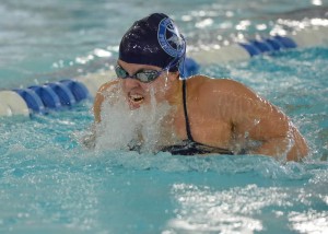 Lawrence's Hayley Cardinal won the 100-yard breaststroke on Saturday at the Midwest Conference Championships.