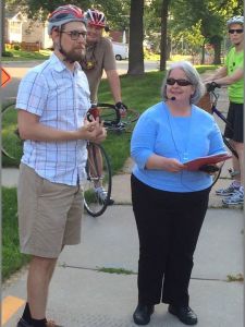 Antoinette (pictured here with Nick Hoffman) talks about the Cleggett-Hollensworth family during the "Bicycling Through Local Black History" tour.