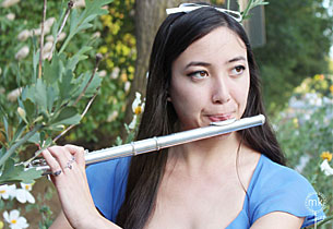 A photo of Lawrence University student Bianca Pratte playing flute.