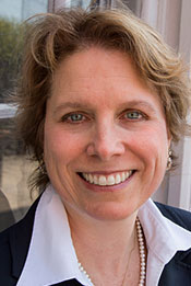 A headshot of chair of the immigration practice group at the Burlington, Vt., law firm Dinse, Knapp & McAndrew, P.C. Leigh Cole.