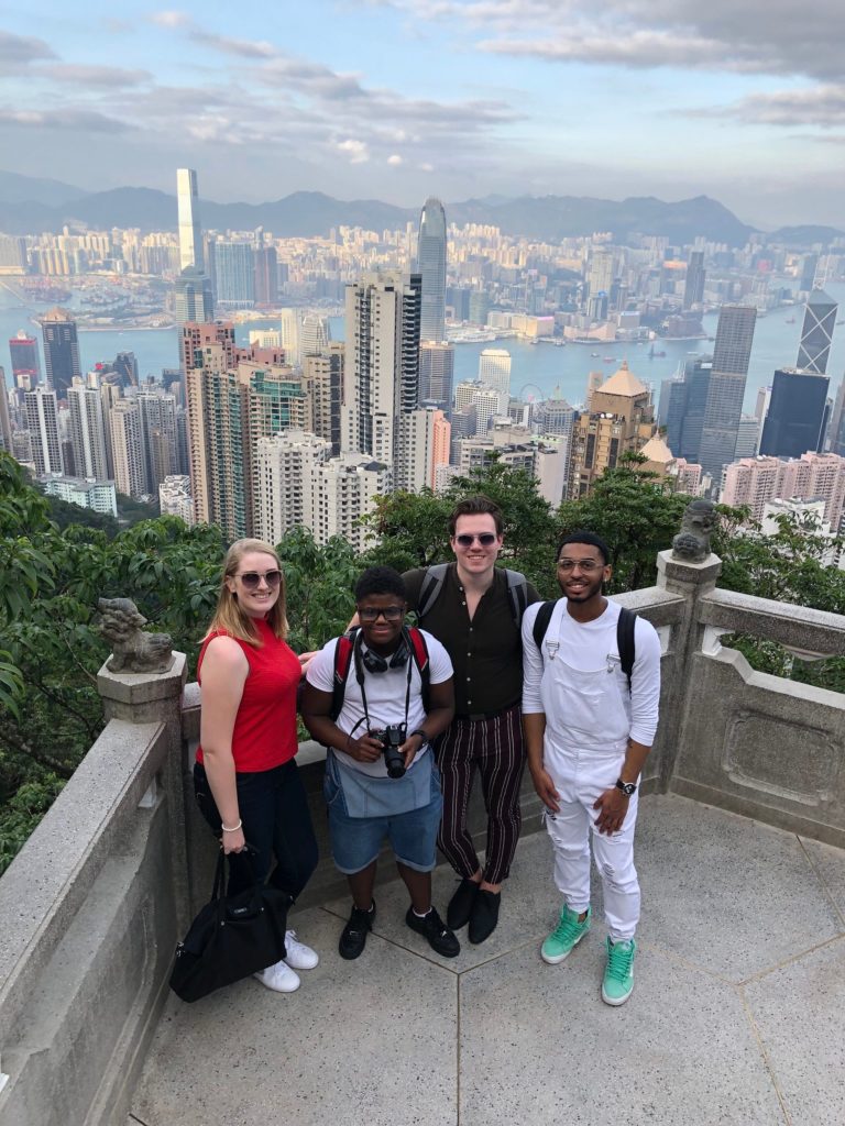 Group of Lawrence students with Hong Kong skyline in background